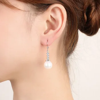 Mode Kvindelige Zircon Øreringe i Sølv Farve Blomst Formet Perle Lang Kvast Øreringe til Kvinder Smykker Pendientes Brincos